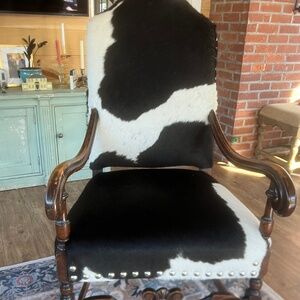 Two cowhide chairs